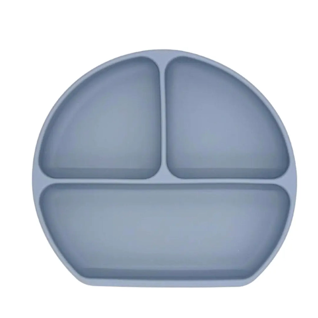 close up image of blue silicone weaning suction plate with white background